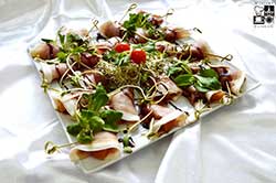 Melon z szynką szwarcwaldzką i aksamitnym balsamico