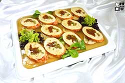 Pierś z kurczaka faszerowana kaparami i suszonymi pomidorami